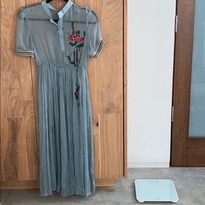 Powder blue silk dress with beaded embellishments